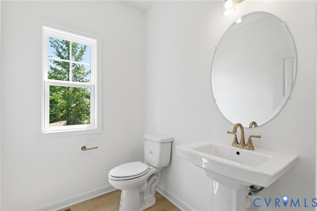 4013 Robins Ridge Drive, Tuckmar Farm, Moseley, VA 23120 First floor half bathroom