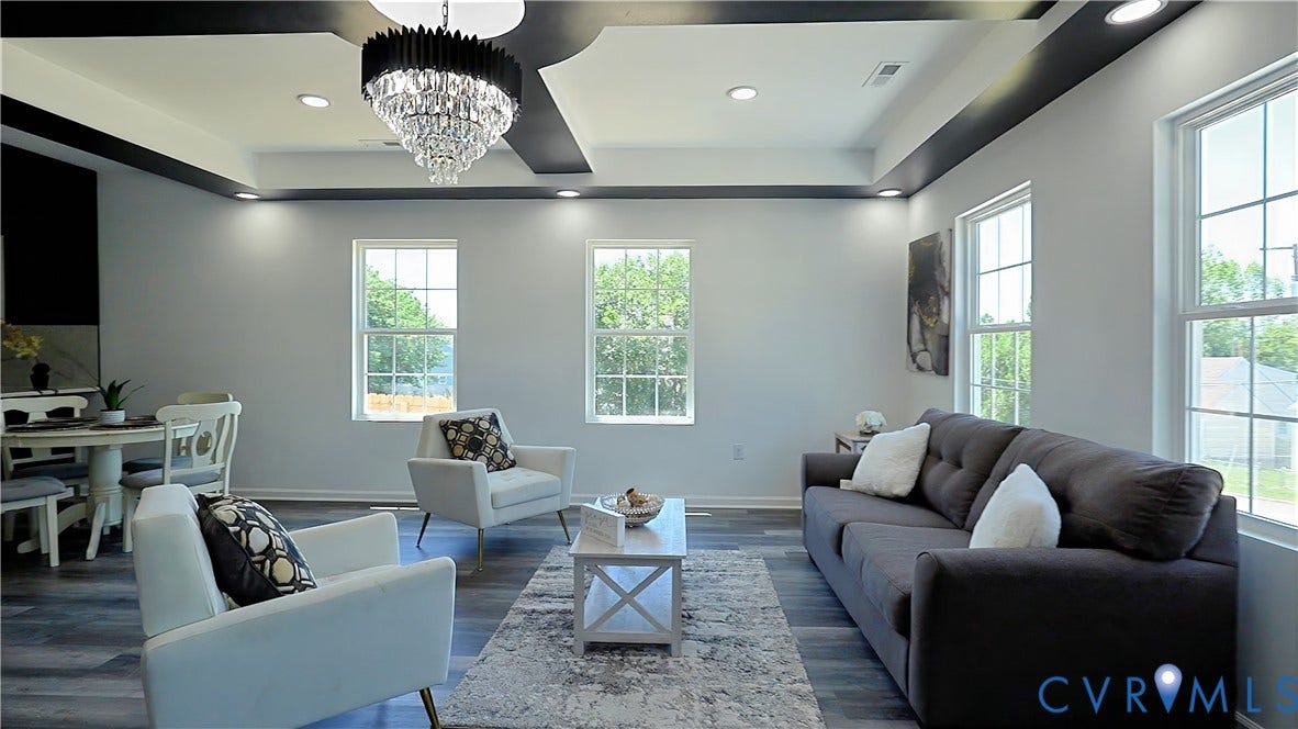 326 Mars Street, Petersburg, VA 23803 Tray ceiling with recessed lighting and a crystal chandelier