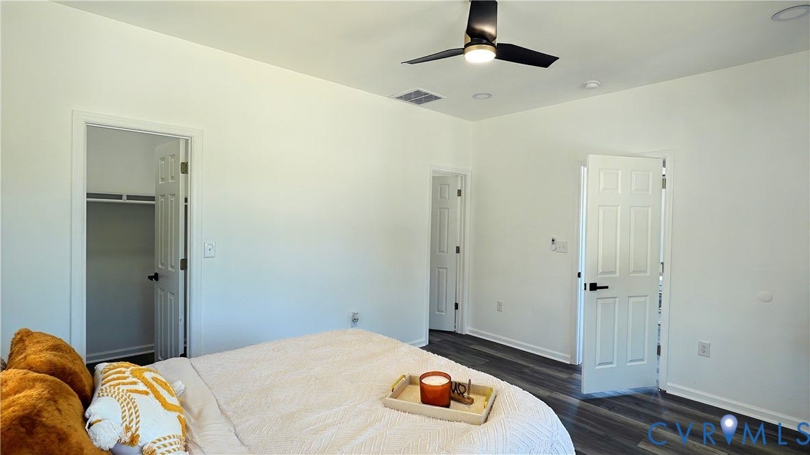 326 Mars Street, Petersburg, VA 23803 Wood-finish flooring, white paneled doors with matte black hardware, recessed lighting, and a ceiling fan