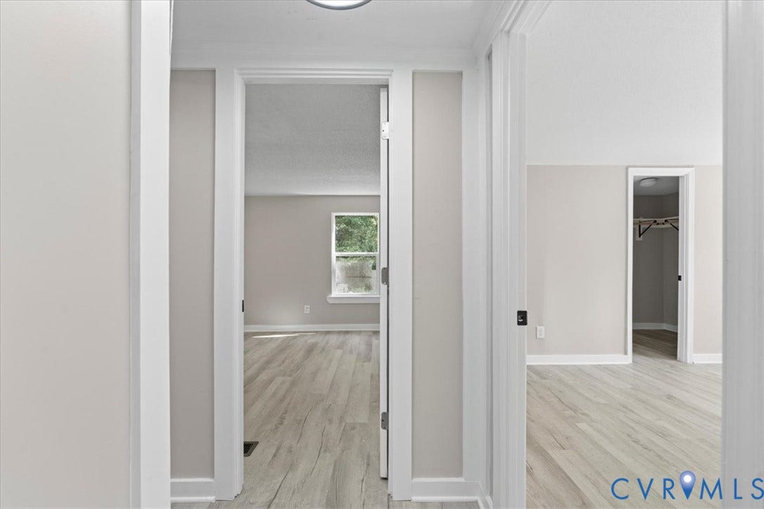 115 Mount Airy Lane, Cumberland, VA 23040 Interior rooms with wood-finish flooring, light-toned walls, and white trim