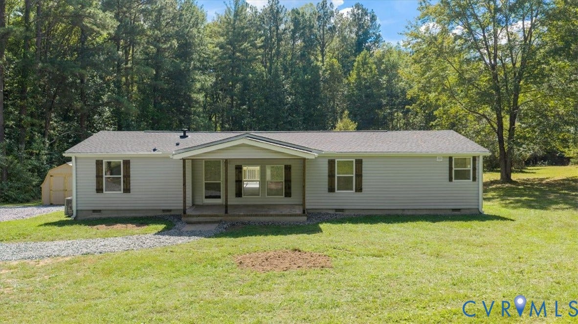 115 Mount Airy Lane, Cumberland, VA 23040 Single-story home featuring light-colored siding and a covered front entry
