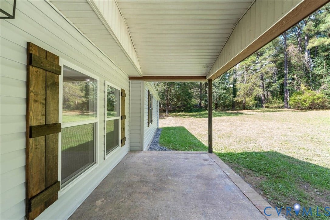 115 Mount Airy Lane, Cumberland, VA 23040 Covered porch with concrete flooring and wood-look support beams