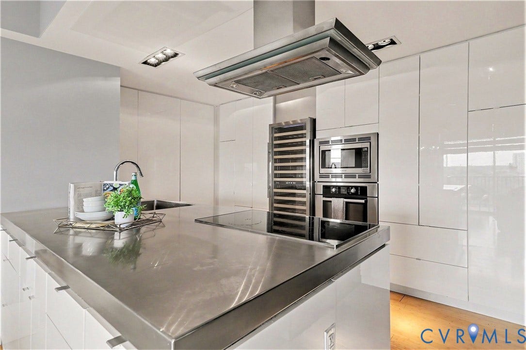 1101 Haxall Point, #U512 U510, Richmond, VA 23219 Kitchen island with stainless steel countertop and integrated sink