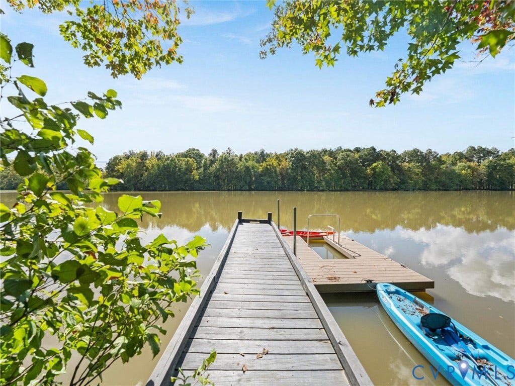 Dock with wood-plank decking and a floating dock extension