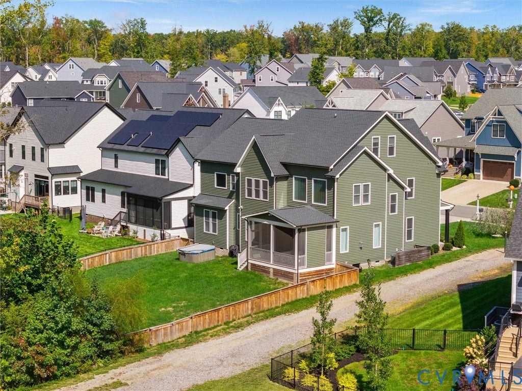 Siding exterior with multiple windows, screened porch, and gabled rooflines