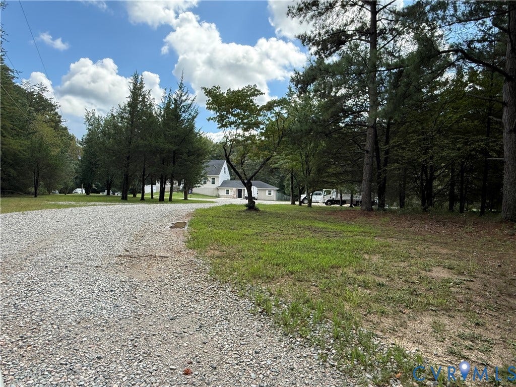 2091 Anderson Highway, Powhatan, VA 23139 Gravel driveway w/ ample parking. Private, peaceful setting!