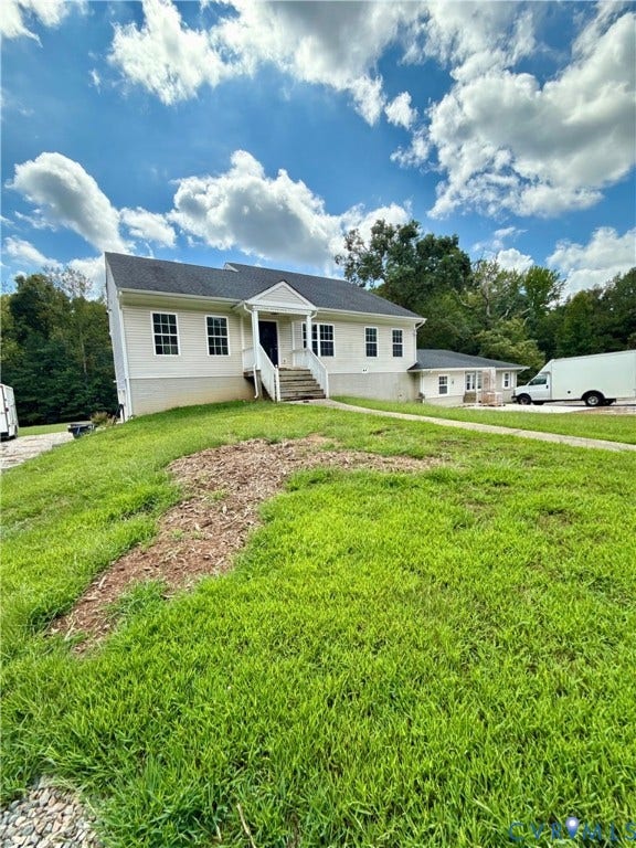 2091 Anderson Highway, Powhatan, VA 23139 Light-colored siding exterior with a dark roof and white trim