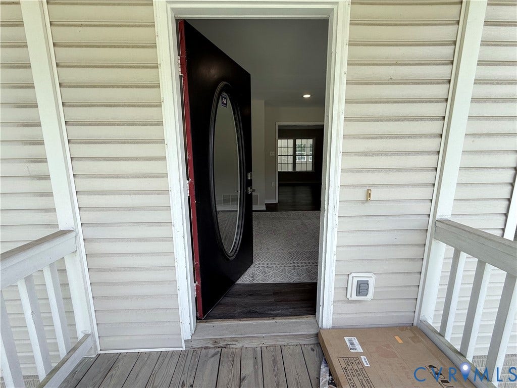 2091 Anderson Highway, Powhatan, VA 23139 Front entry with a dark-paneled door featuring an oval-shaped inset window