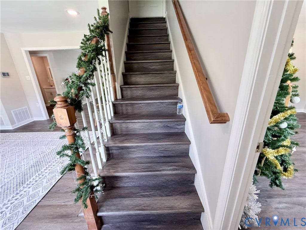 2091 Anderson Highway, Powhatan, VA 23139 Staircase leading to the unfinished attic/storage space.