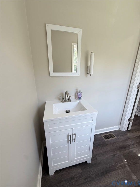 2091 Anderson Highway, Powhatan, VA 23139 White vanity with shaker-style doors and dark hardware(Rear facing/private bathroom)