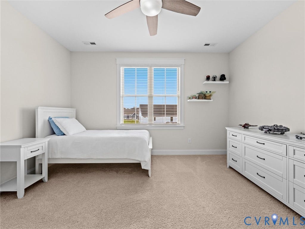 3719 Bellstone Drive, Midlothian, VA 23112 Carpeted room with a ceiling fan, a window with blinds, and built-in floating shelves
