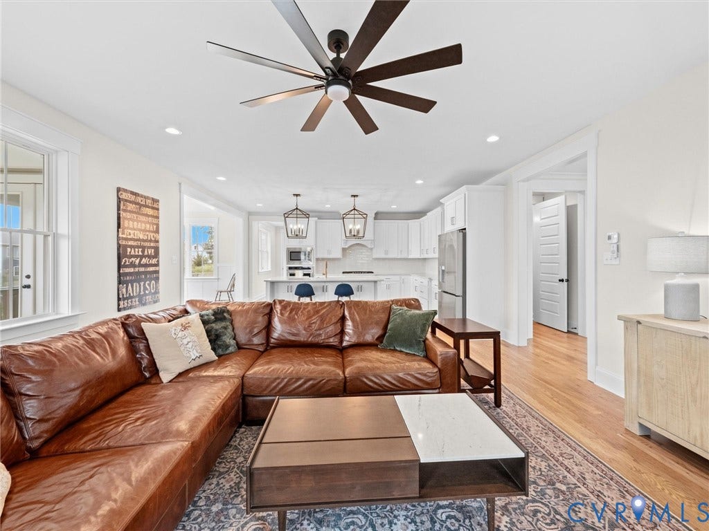 3719 Bellstone Drive, Midlothian, VA 23112 Open-concept living space featuring recessed lighting, a ceiling fan, and light wood-finish flooring