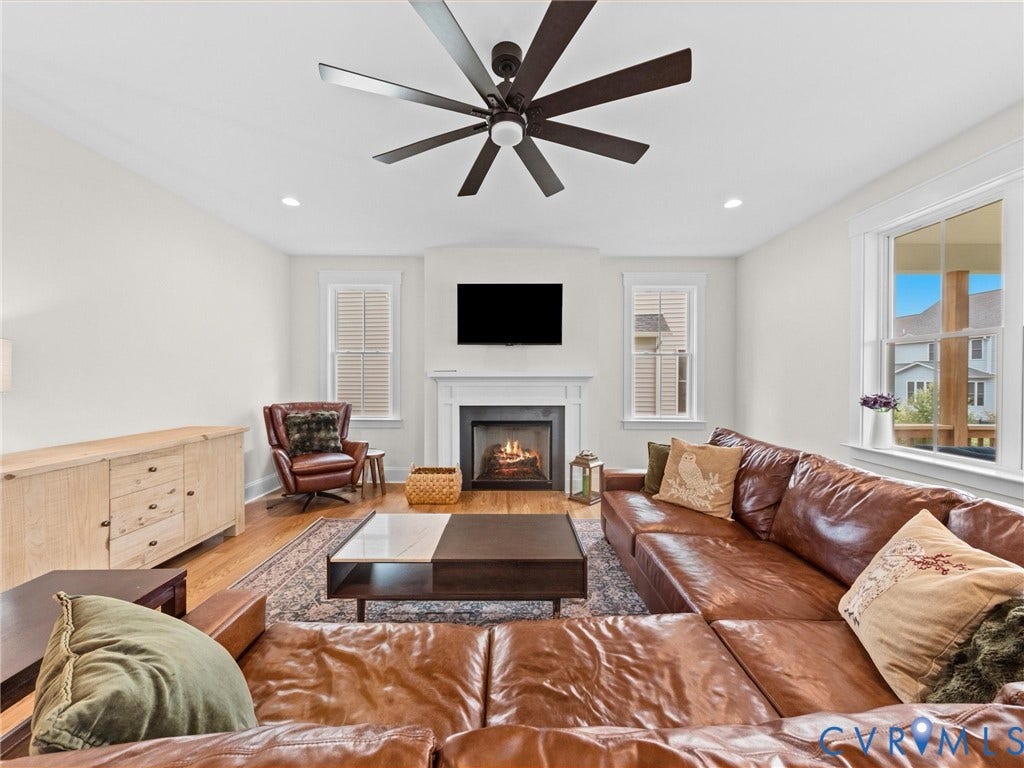 3719 Bellstone Drive, Midlothian, VA 23112 Wood-finish flooring with a decorative area rug