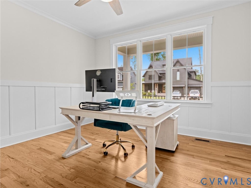 3719 Bellstone Drive, Midlothian, VA 23112 Hardwood flooring, board and batten wall detailing, crown molding, and a ceiling fan