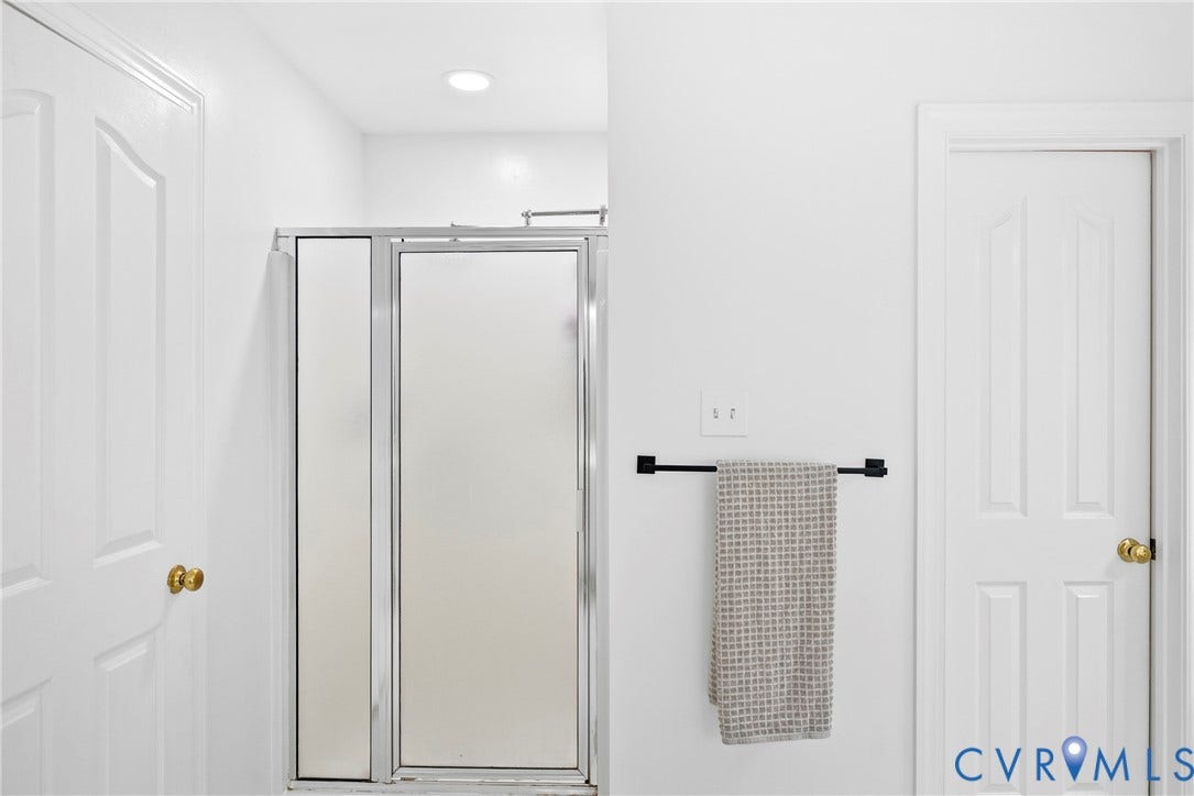 8406 Chandon Court, Chesterfield, VA 23838 Enclosed shower with frosted glass panels and chrome framing
