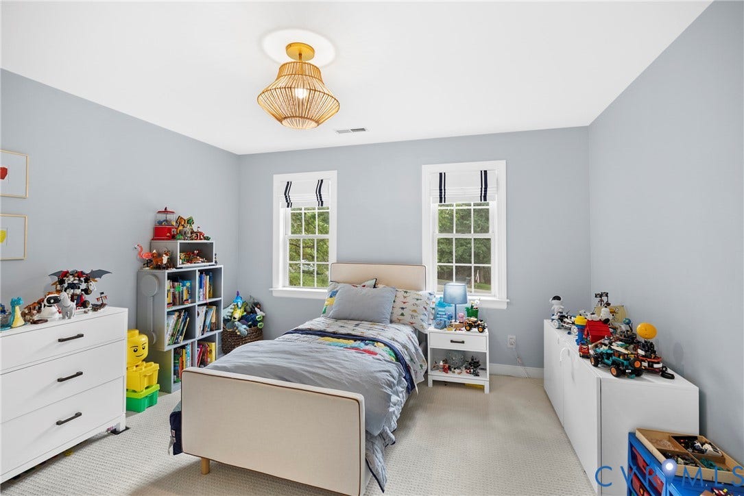 8406 Chandon Court, Chesterfield, VA 23838 Recessed lighting, two double-hung windows, built-in shelving, and a decorative ceiling fixture