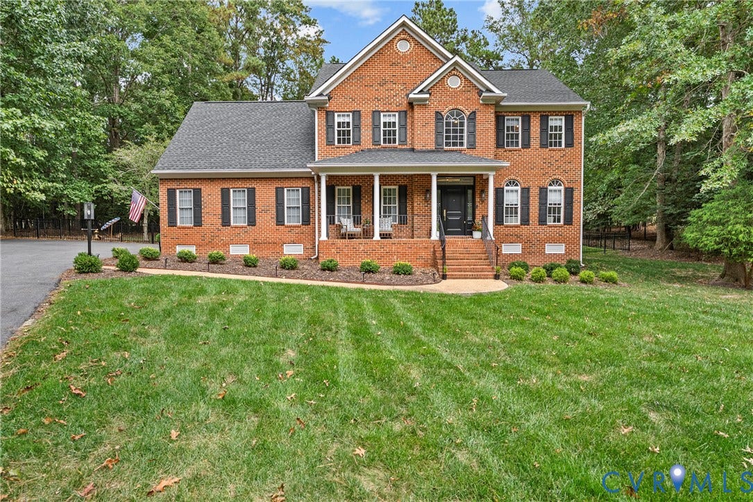 8406 Chandon Court, Chesterfield, VA 23838 Brick exterior with a covered front porch and a gabled roofline