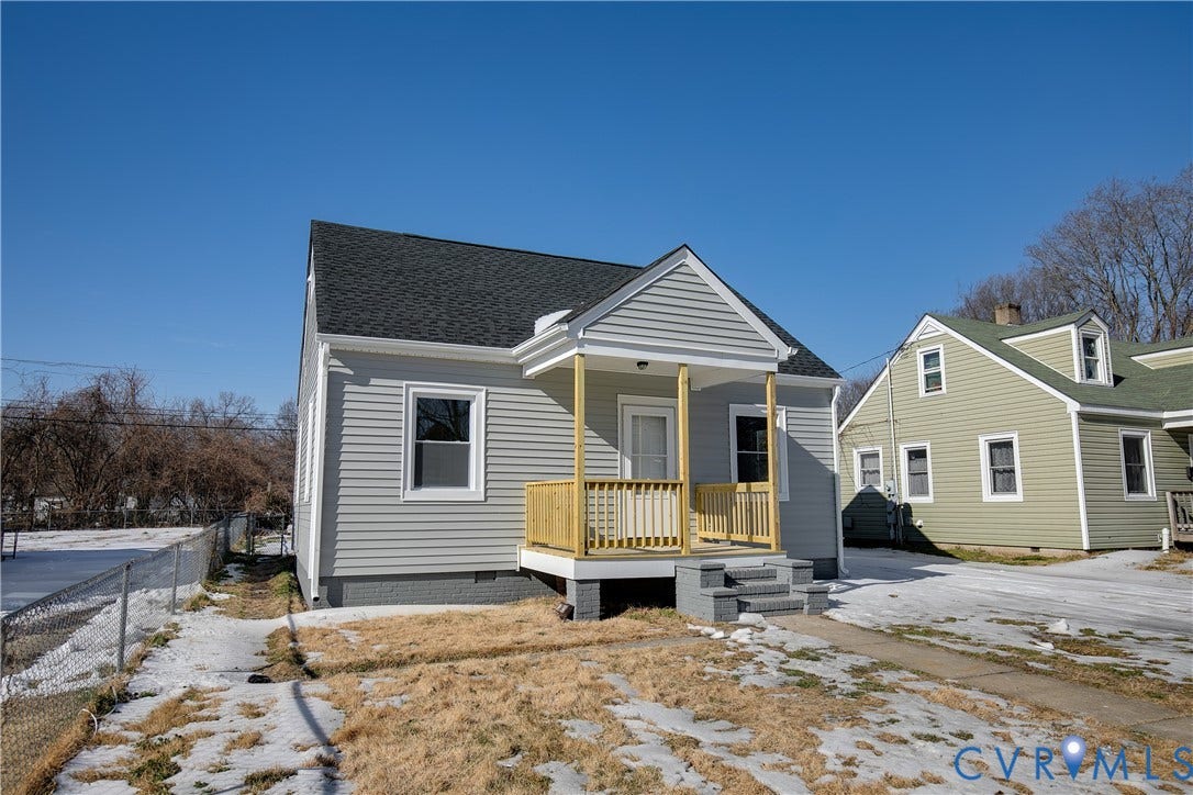 1305 Overlook Street, Richmond, VA 23224 Light gray siding exterior with a dark gray shingle roof