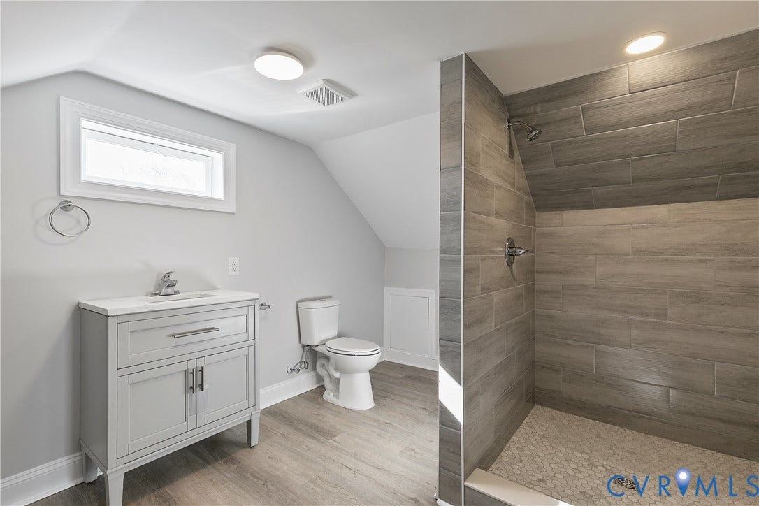 1305 Overlook Street, Richmond, VA 23224 Walk-in shower with large format tile surround and hexagonal tile flooring