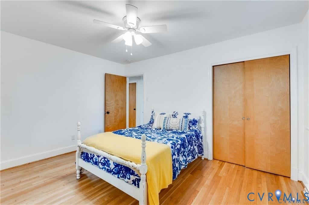 2304 Buckingham Avenue, Henrico, VA 23228 Hardwood flooring throughout, featuring a ceiling fan with integrated lighting, and a bi-fold closet with wood panel doors