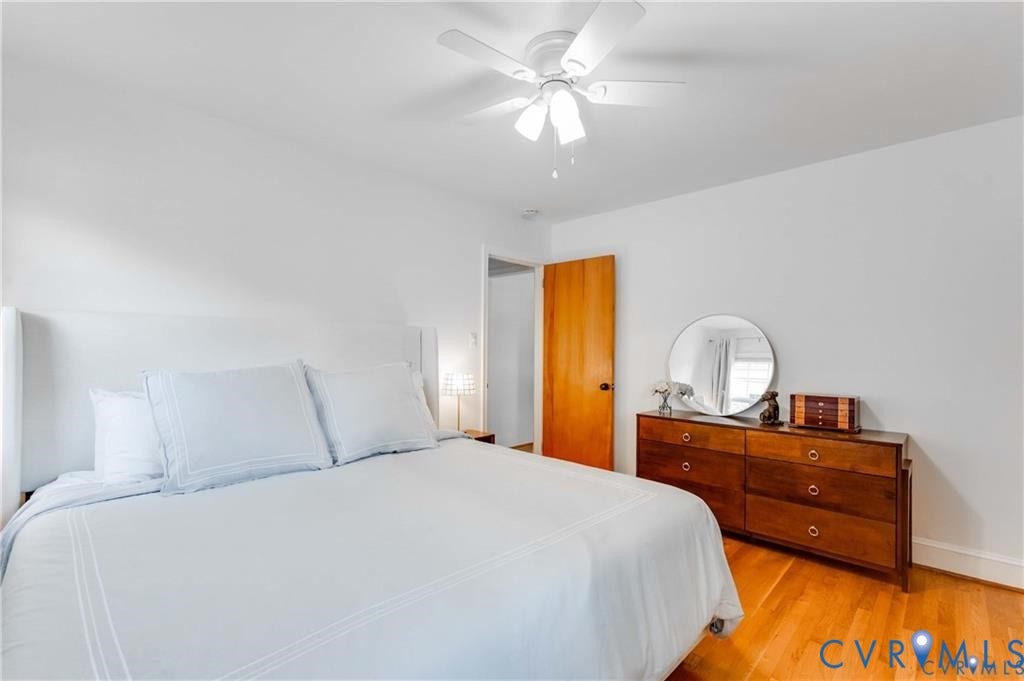 2304 Buckingham Avenue, Henrico, VA 23228 Hardwood flooring, crisp white walls, and a ceiling fan with integrated lighting