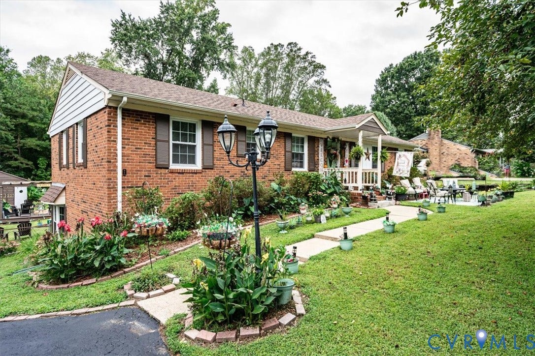 5510 Alberta Road, Stanwick, Midlothian, VA 23832 Brick exterior with white window frames and brown shutters