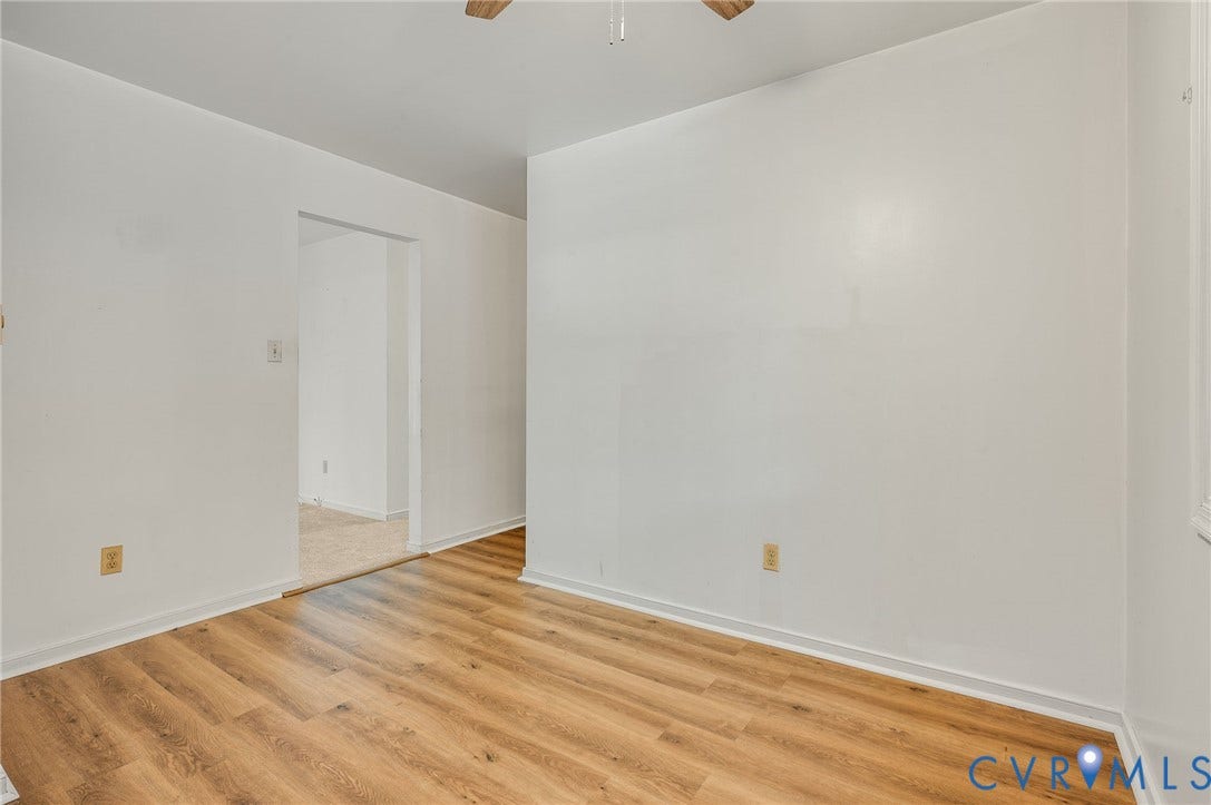 Wood-finish flooring with white wall finishes