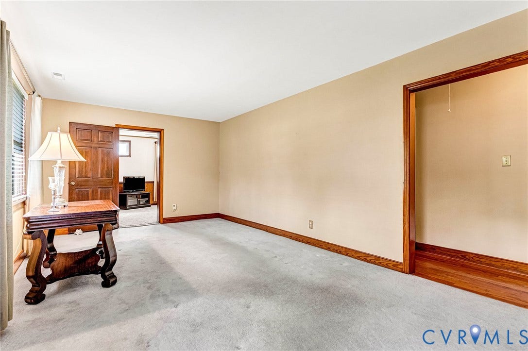 Imagine a large picture on the wall above a sofa.  Easy Chair in the Corner.