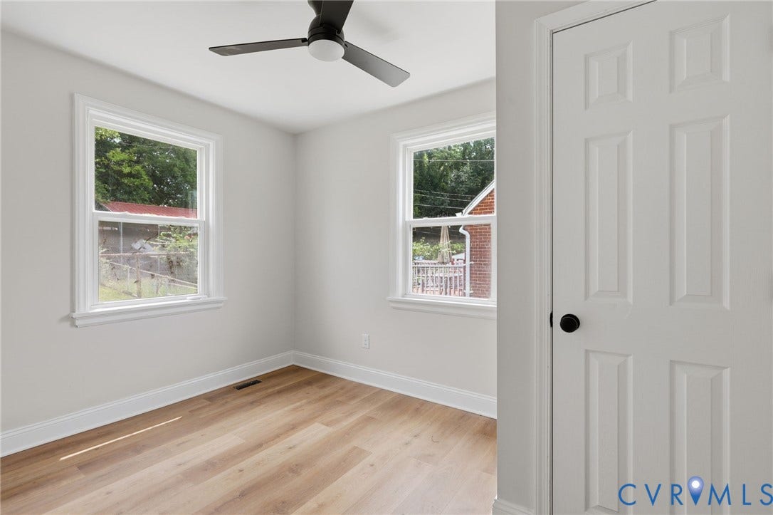 Recessed lighting, wood-finish flooring, white trim, and a ceiling fan