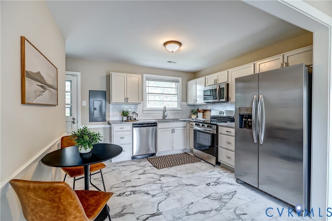 New cabinets, not just painted like you see in others!  Tile floor; THIS IS STUNNING