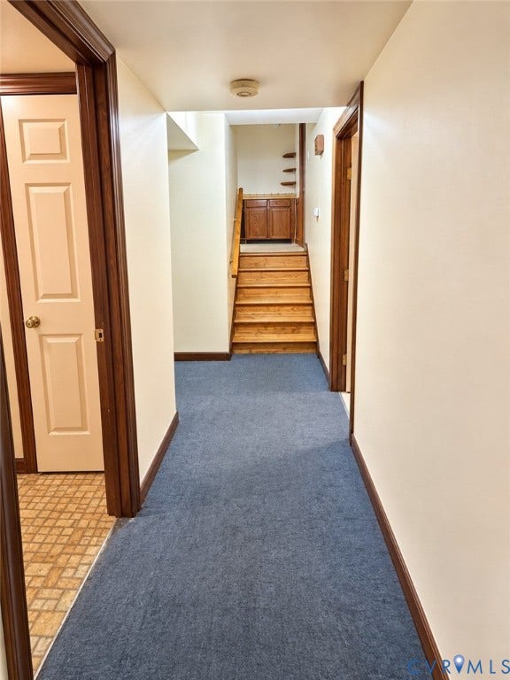 8636 Shadymist Drive, North Chesterfield, VA 23235 hallway looking from office toward stairs leading to the kitchen; laundry room to the left
