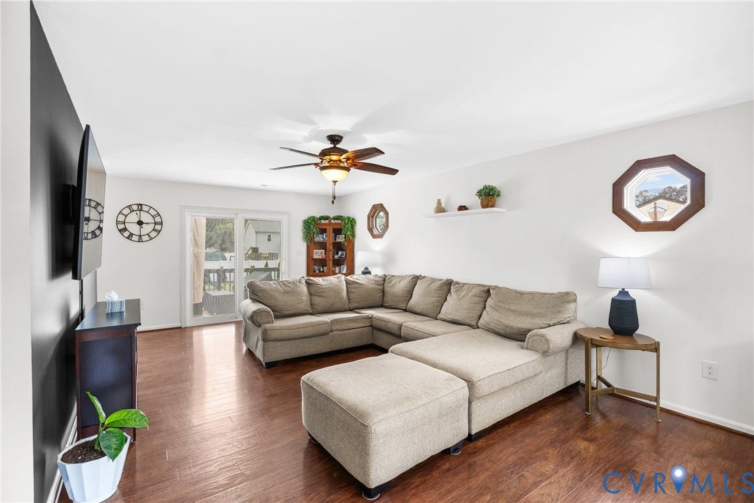 Recessed lighting, wood-finish flooring, ceiling fan, sliding glass doors, and octagonal window