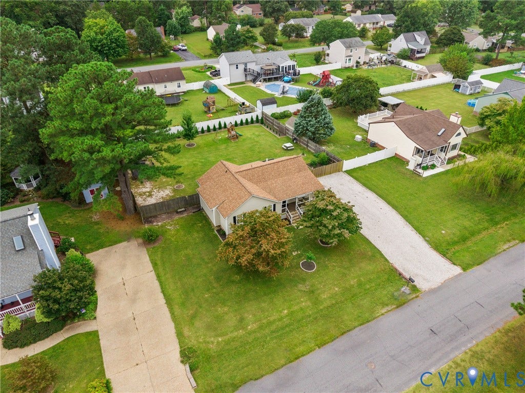 Single-story residence with a covered front porch and a gabled roof
