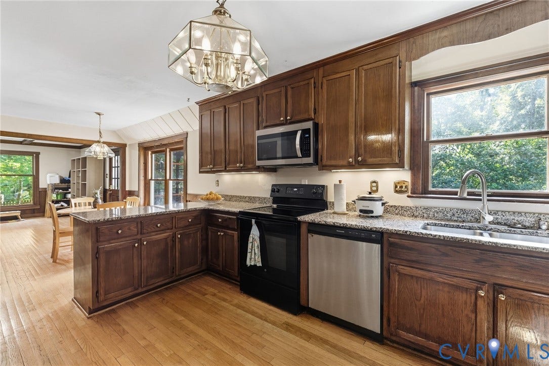 Kitchen contains abundant cabinetry