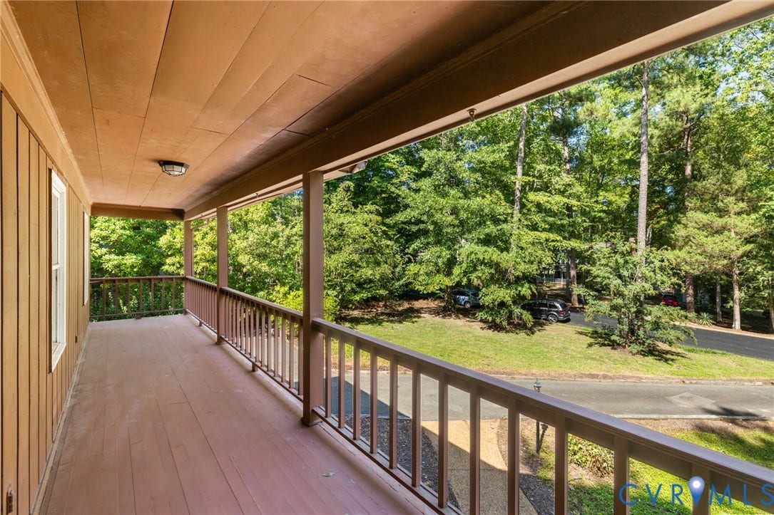 Enter the upstairs porch from the primary bedroom for quiet relaxing.