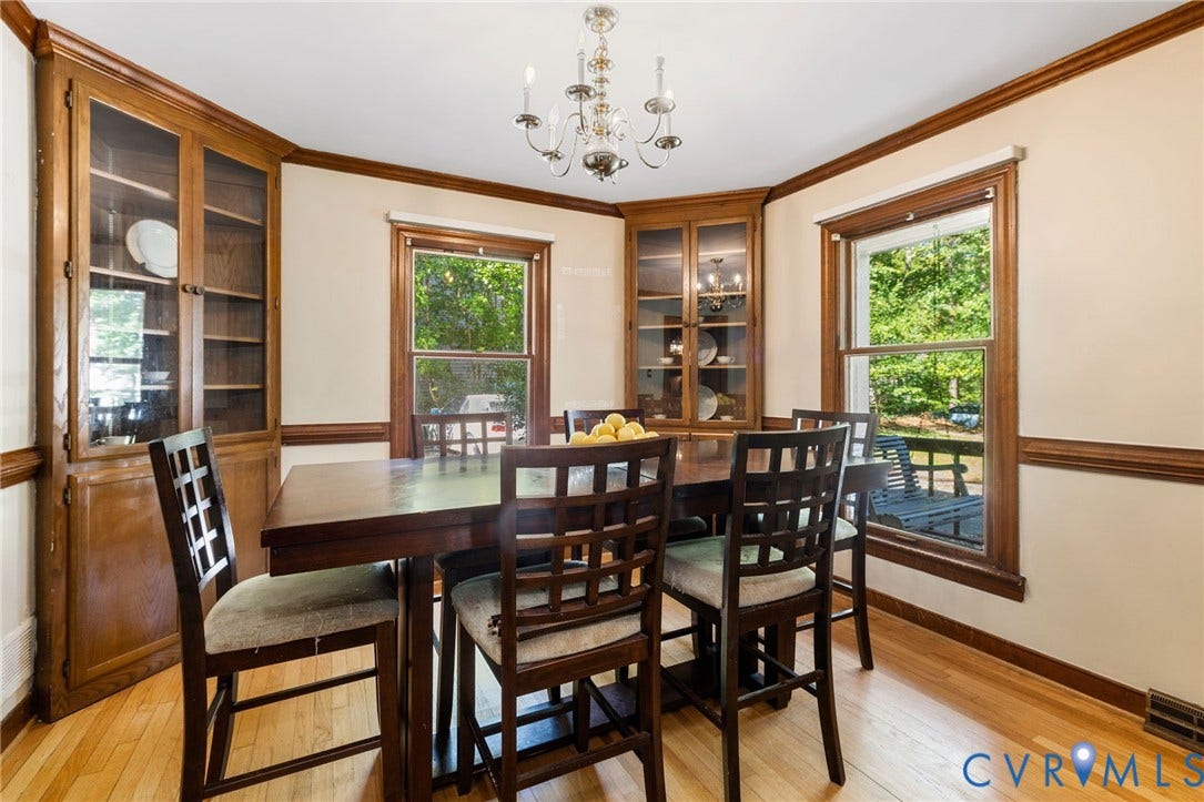 Spacious kitchen with granite countertops and raised panel cabinets