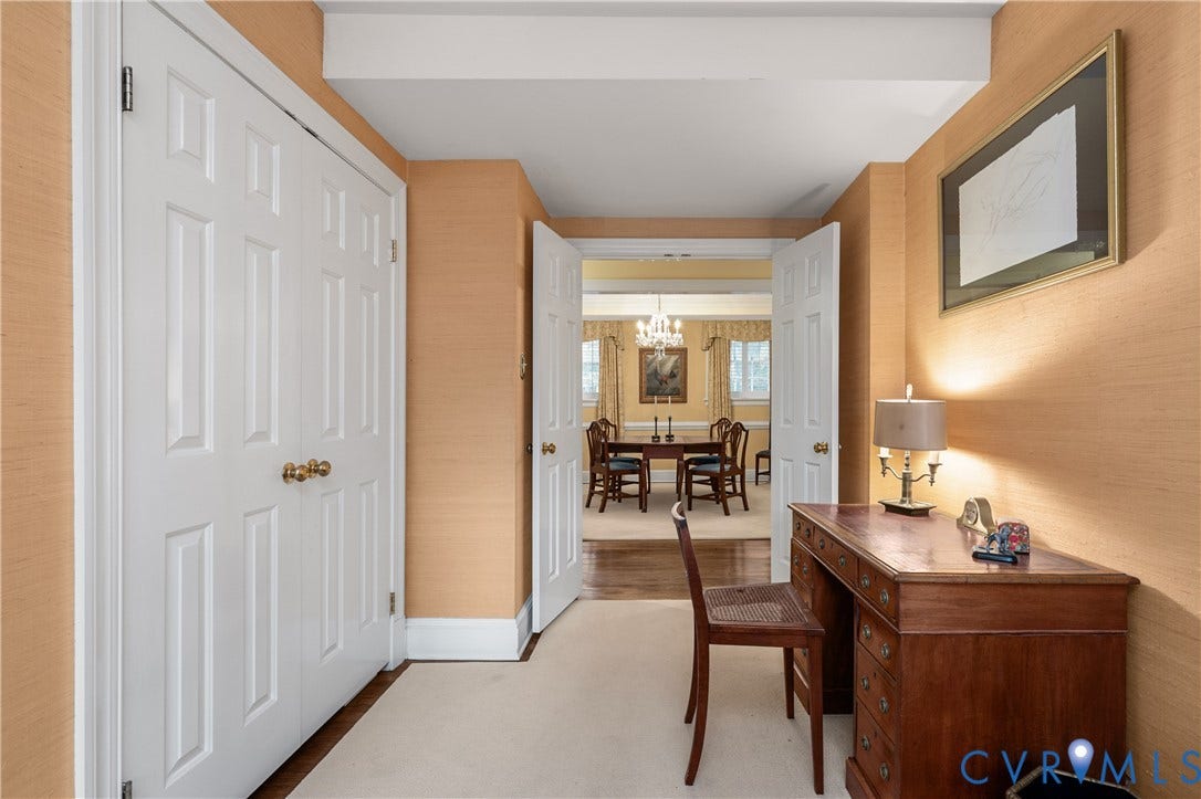 5621 Cary Street Road, #U4, Wilton, Richmond, VA 23226 Textured wallpaper, double-door storage closet, and recessed double-door entry