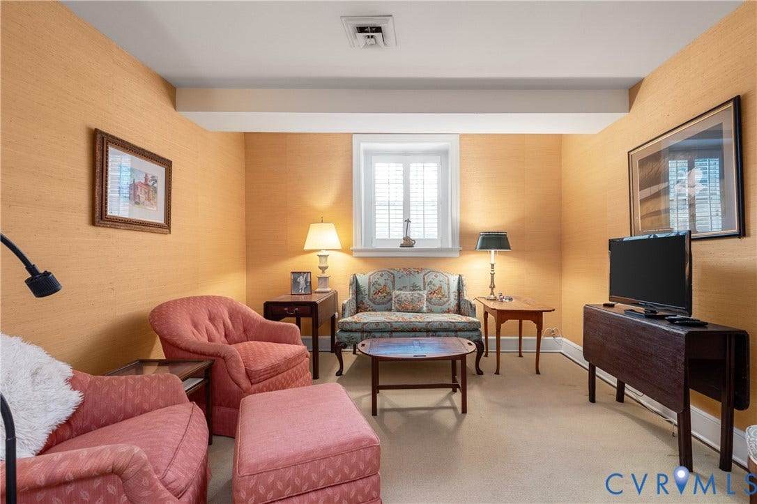 5621 Cary Street Road, #U4, Wilton, Richmond, VA 23226 Textured wall coverings, window with integrated shutters, and neutral carpeting