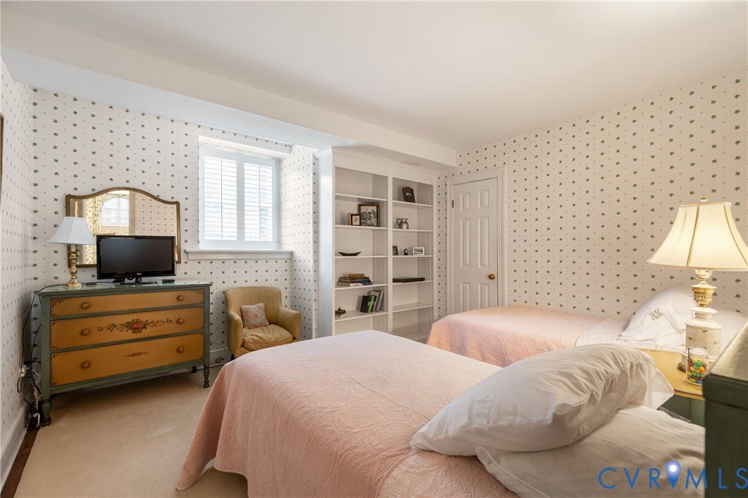 5621 Cary Street Road, #U4, Wilton, Richmond, VA 23226 Built-in shelving unit with multiple tiers and single-pane window featuring interior plantation shutters