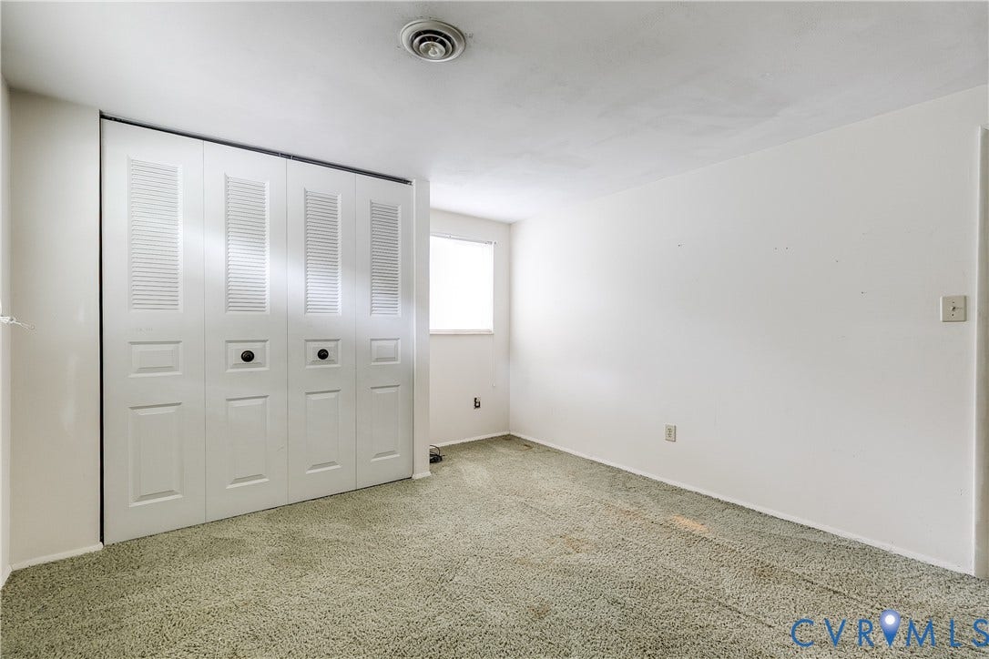 Wall-to-wall carpeting with a neutral color palette