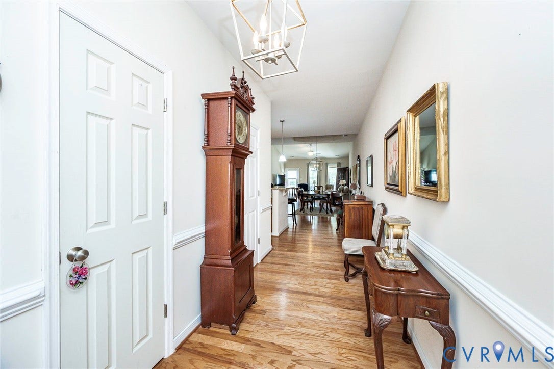 Coat closet is the first door to the left
