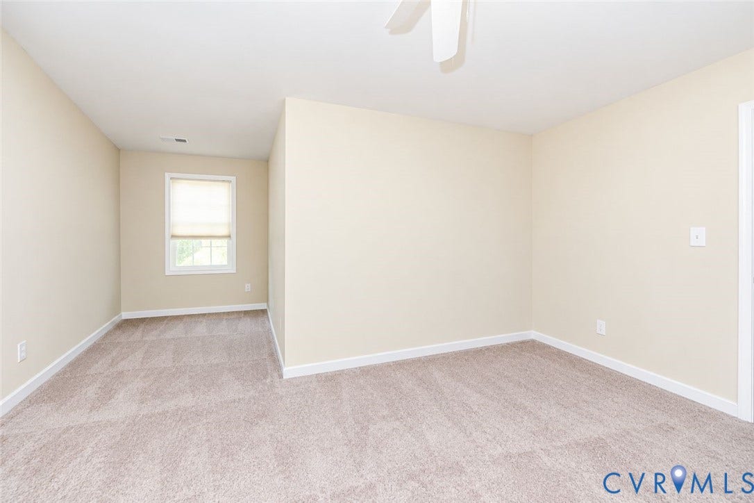 Same room with personal items removed using AI
