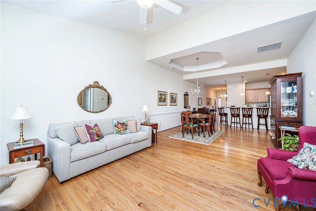 View from the living area to the dining and kitchen areas