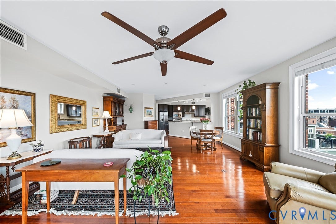 4820 Old Main Street, #503, Sky Line Condo, Richmond, VA 23231 High ceilings with a ceiling fan, polished wood-finish flooring, multiple windows, and recessed lighting