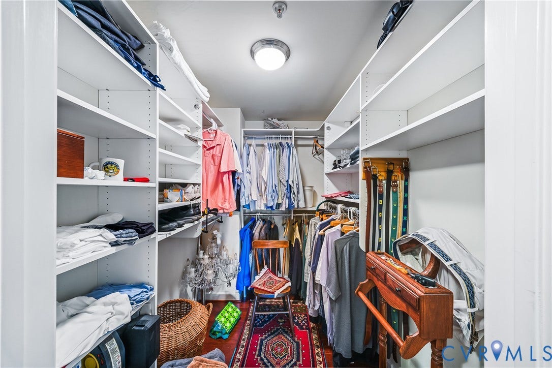4820 Old Main Street, #503, Sky Line Condo, Richmond, VA 23231 Walk-in closet featuring white shelving, multiple hanging rods, and recessed ceiling lighting