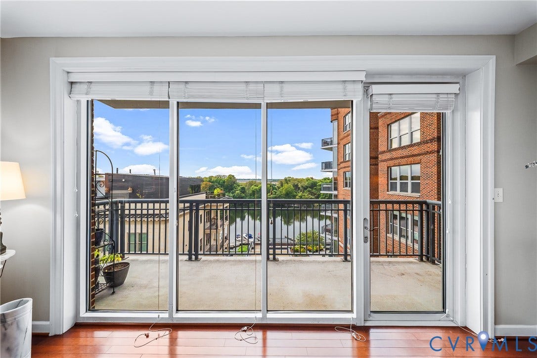 4820 Old Main Street, #503, Sky Line Condo, Richmond, VA 23231 Sliding glass doors opening to an outdoor balcony with metal railings