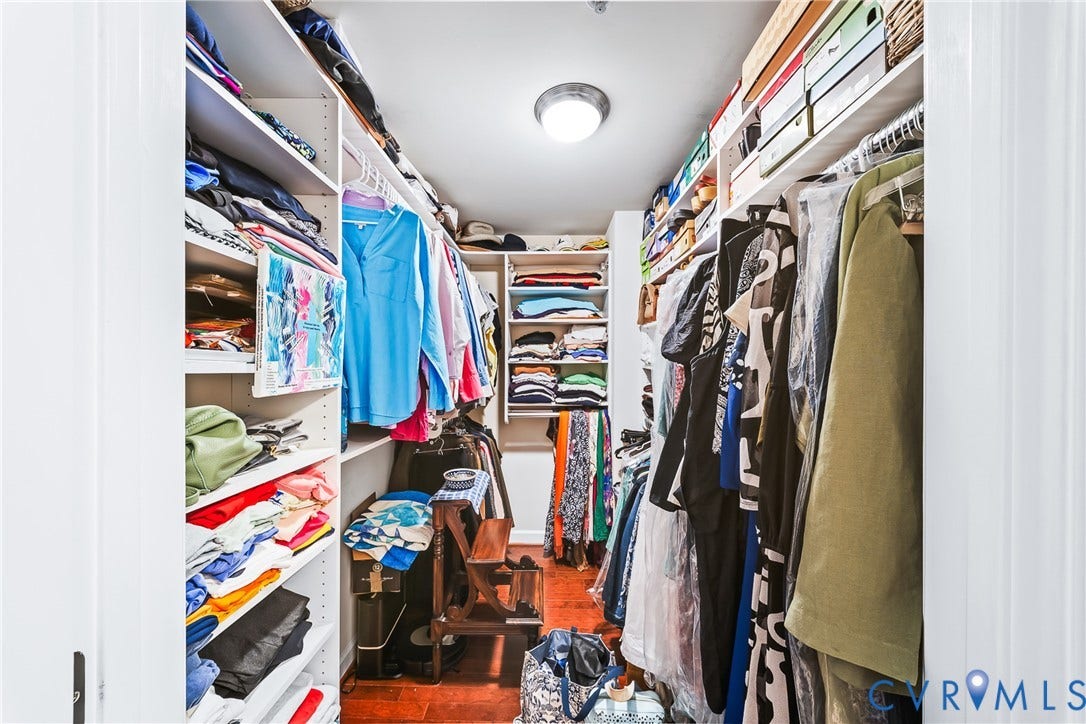 4820 Old Main Street, #503, Sky Line Condo, Richmond, VA 23231 Custom closet system featuring white shelving, hanging rods, and recessed lighting