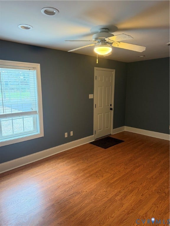 6323 Mallory Drive, Richmond, VA 23226 Wood-finish flooring, recessed lighting, ceiling fan with integrated light, and white paneled door
