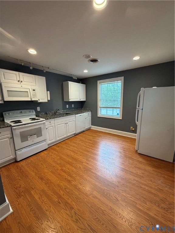 6323 Mallory Drive, Richmond, VA 23226 Wood-finish flooring, white cabinetry, integrated stainless steel sink, and recessed lighting