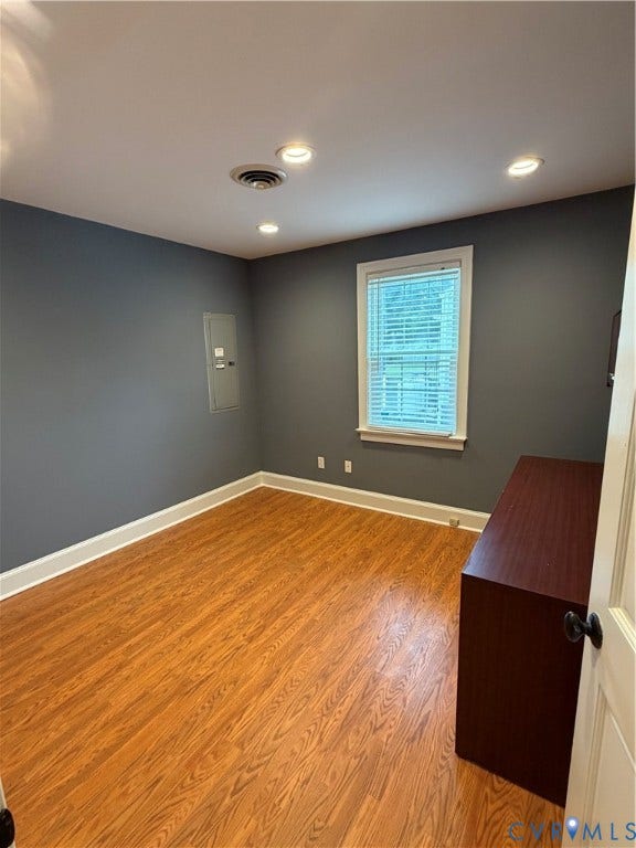 6323 Mallory Drive, Richmond, VA 23226 Recessed ceiling lighting, wood-finish flooring, white window trim, and white baseboards
